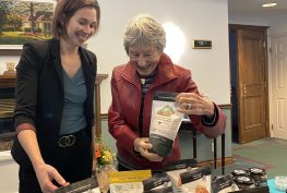 Raw Carrot community engagement manager Elena Haskell and St. Andrew's Barrie's Penny Barker restock the sales table and talk about the seasonal flavours of the heart-warming soups.